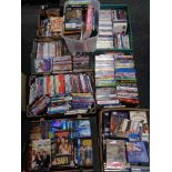 Eight boxes and crates containing assorted DVDs.