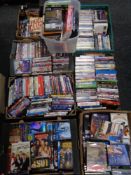 Eight boxes and crates containing assorted DVDs.