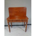 A Victorian mahogany turnover top tea table