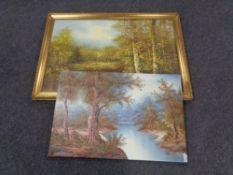 A gilt framed oil on canvas woodland scene, signed J.