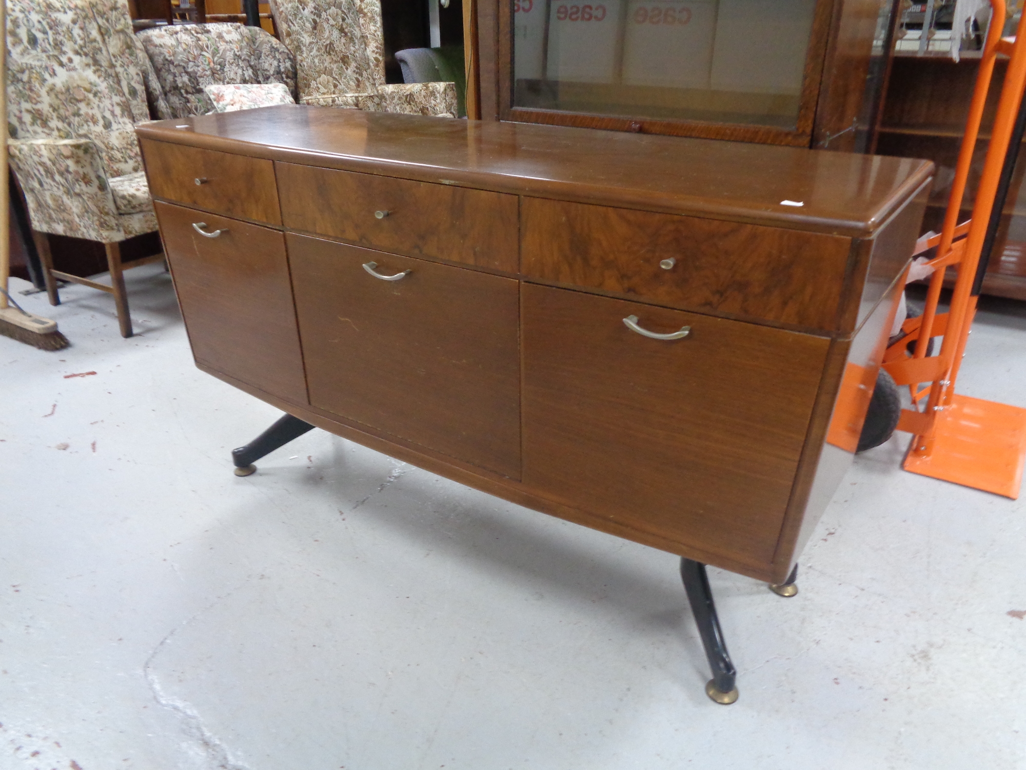 A mid 20th century Stonehill Furniture triple door sideboard