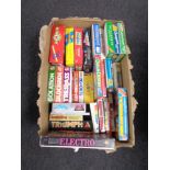 A box containing a large quantity of assorted vintage and later board games.