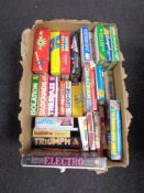 A box containing a large quantity of assorted vintage and later board games.