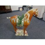 A large glazed pottery Tang style horse, height 79 cm.