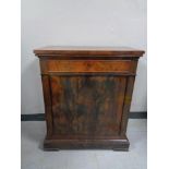 A nineteenth century mahogany cabinet fitted with drawer above
