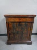 A nineteenth century mahogany cabinet fitted with drawer above