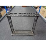 A 19th century cast iron Coalbrookdale stick stand with lift out tray,