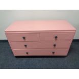 A 20th century painted four drawer chest.