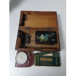 An antique marquetry trinket box containing a further black lacquer trinket box, assorted keys,