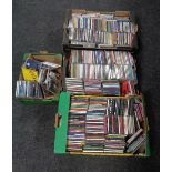 Two boxes containing a large quantity of assorted CDs.