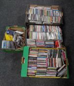 Two boxes containing a large quantity of assorted CDs.