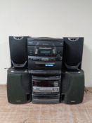 An Aiwa Hi-Fi system together with a Venturer Hi-Fi system.