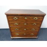 A late 19th century mahogany four drawer chest with brass handles and mounts.