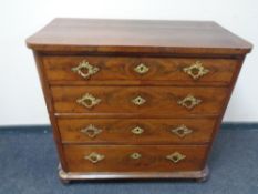 A late 19th century mahogany four drawer chest with brass handles and mounts.