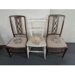 A pair of antique mahogany tapestry seated bedroom chairs together with a further painted bedroom