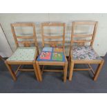 Three 1930's oak dining chairs