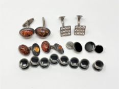 Two pair of silver and amber cuff links, a stone set pair of silver cuff links,