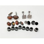 Two pair of silver and amber cuff links, a stone set pair of silver cuff links,