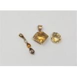 Three gold citrine pendants (3)