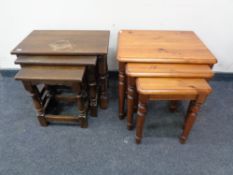 A nest of three pine tables together with a nest of three oak tables.