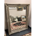 A silvered Victorian style mirror,