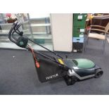 A Hayter Spirit 41 electric lawn mower with grass box