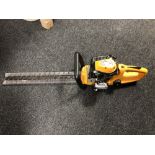 A JCB petrol hedge trimmer.