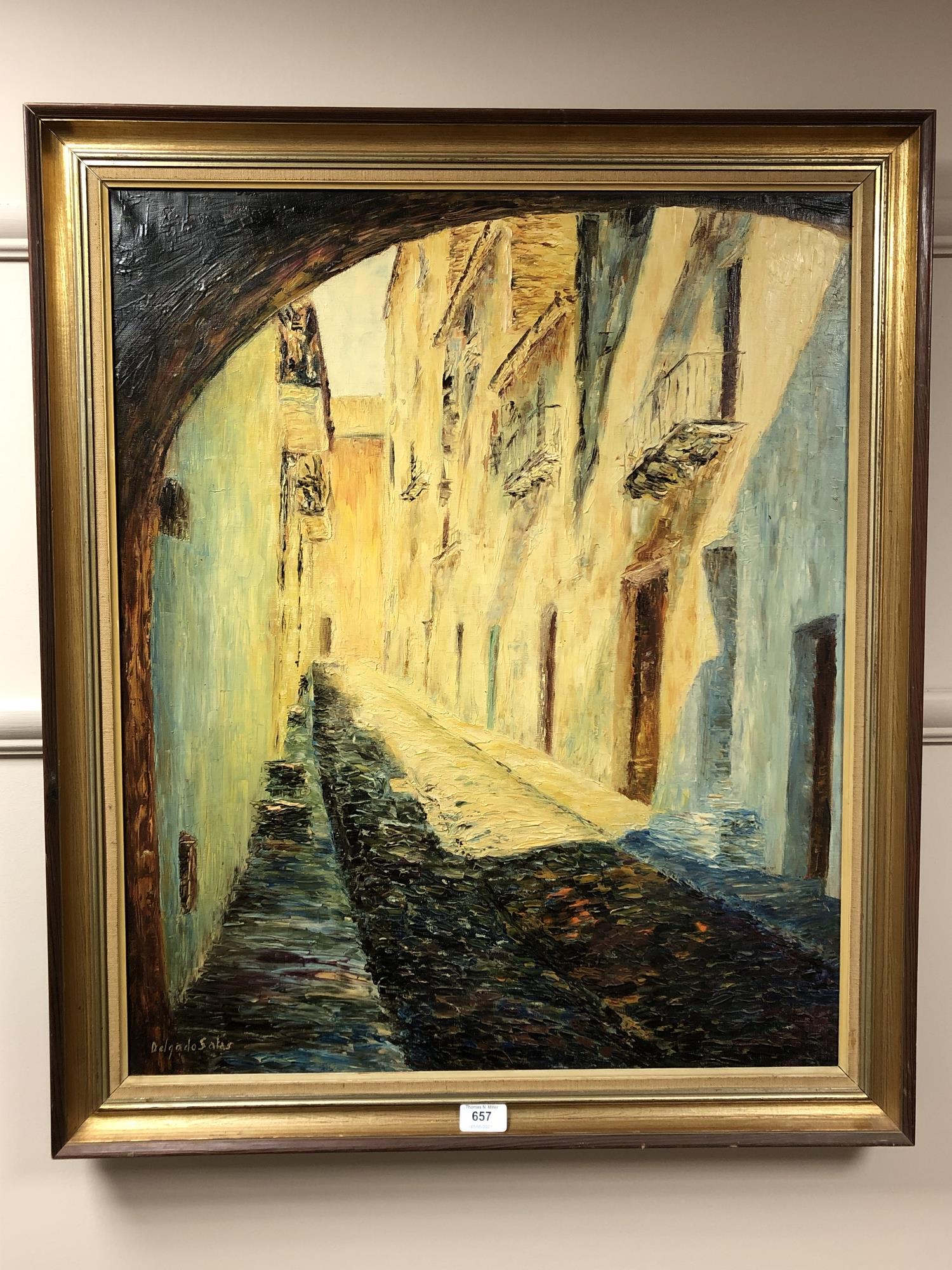 Continental School : Cobbled Street, oil on canvas, 58 cm x 70 cm, Signed Delgado Satas, framed.