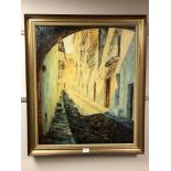 Continental School : Cobbled Street, oil on canvas, 58 cm x 70 cm, Signed Delgado Satas, framed.