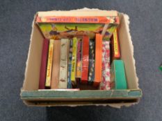 A box containing vintage board games to include Magnetic Cup Final, Pixie Derby, etc.