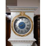 A continental painted cased longcase clock with metal dial, pendulum, no weights.