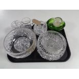 A tray containing assorted glassware, glass paperweights, 1970s green glass bowl.