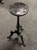 A painted antique three way pedestal wine table.