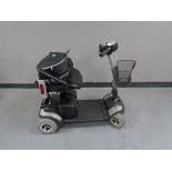 A TJA Eclipse electric mobility cart with key and charger - needs attention CONDITION