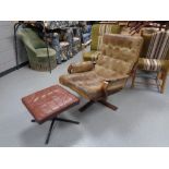 A twentieth century stained beech framed buttoned leather armchair together with similar footstool