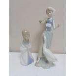 Two Lladro figures, Girl feeding ducks and Girl kneeling.