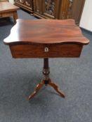 A late nineteenth century sewing table on tripod pedestal