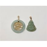 Two gold jade mounted pendants (2)