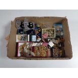 A box containing a quantity of assorted costume jewellery to include earrings, necklaces,