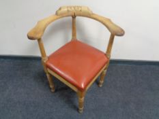 A 20th century oak corner chair.