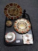 A tray containing two Royal Crown Derby plates on stands (one restored),