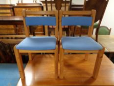 A set of six pine Danish T.S.M dining chairs.