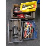 A box containing power tools, extension reel,