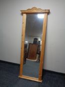 A pine hall mirror.