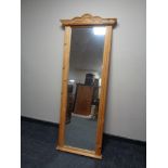 A pine hall mirror.