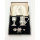 A boxed silver Christening set