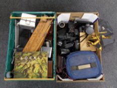 A crate and a box containing a large quantity of assorted cameras to include Chinon, Kodak,