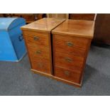 A pair of mahogany three drawer dressing chest pedestals.