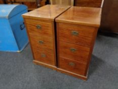 A pair of mahogany three drawer dressing chest pedestals.