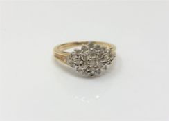 A 9ct gold diamond cluster ring, approximately 0.5ct, size M/N, 3.3g.